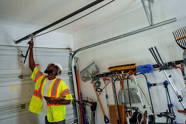 Professional Garage Door Panel Replacement technician working in St. Louis, MI